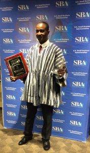 Mohammed Aminu Osman receiving the award